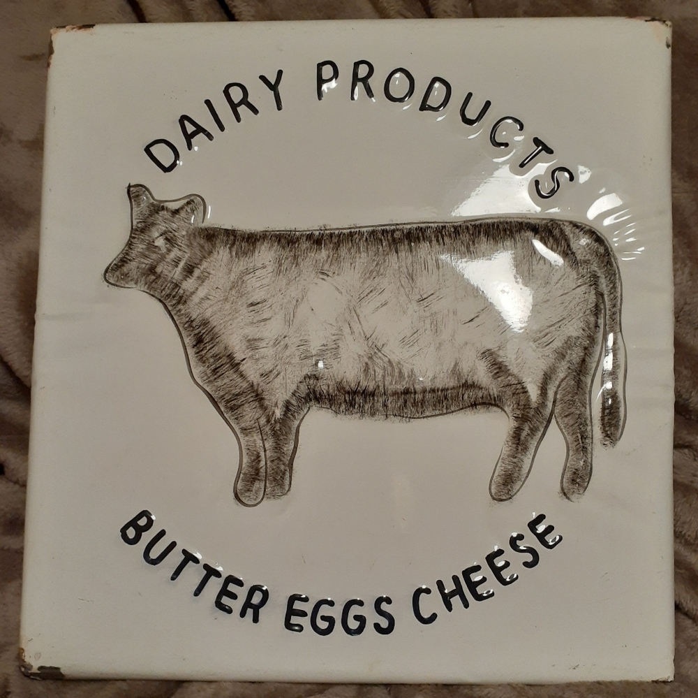 Metal Dairy sign with cow